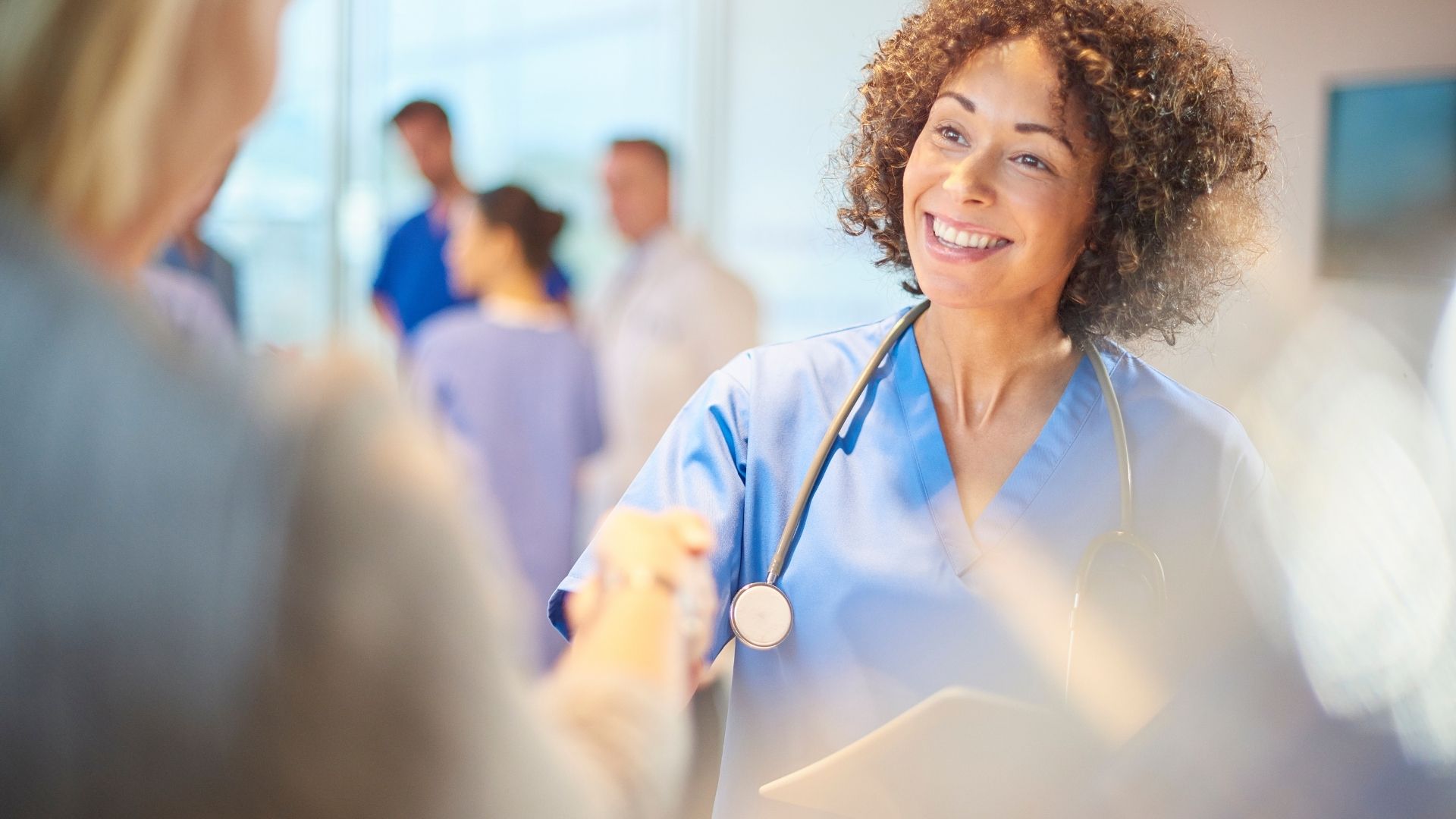 Doctor shaking patient hand