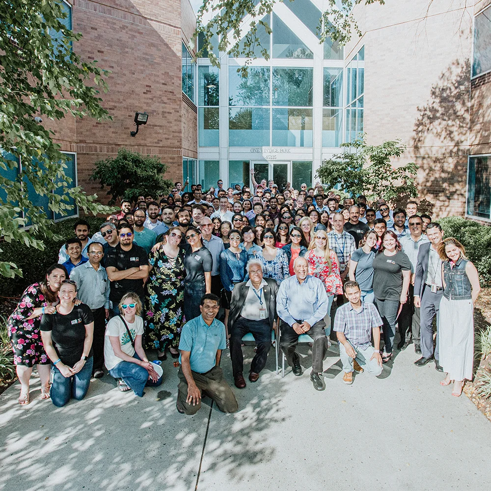 REI team in front of the REI headquarters